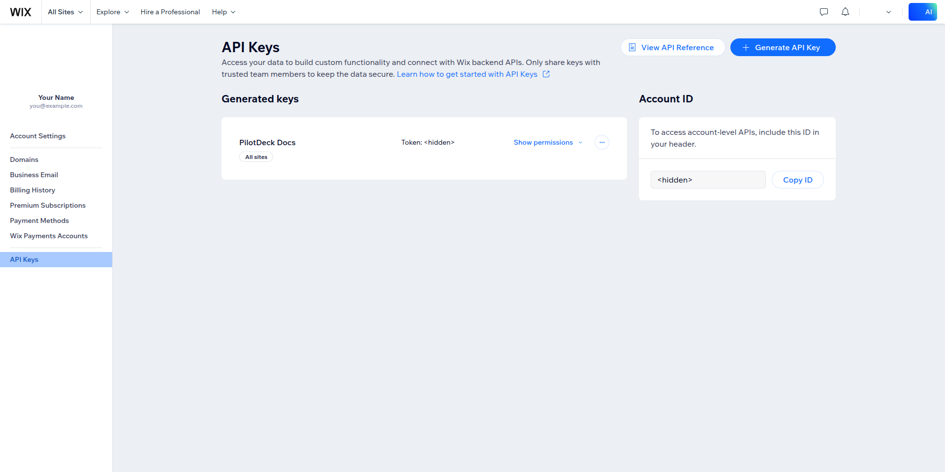 Wix API Keys page with a generated key and the Account ID